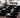 Black bold geometric tufted wool area rug, 5x8 ft