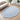 Modern hand-tufted wool rug with scalloped border, baby blue and ivory